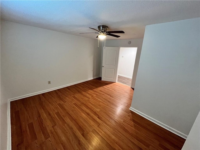 701 Cameron M Alexander Blvd NW, Atlanta, GA 30318 - unfurnished room featuring ceiling fan, wood finished floors, and baseboards