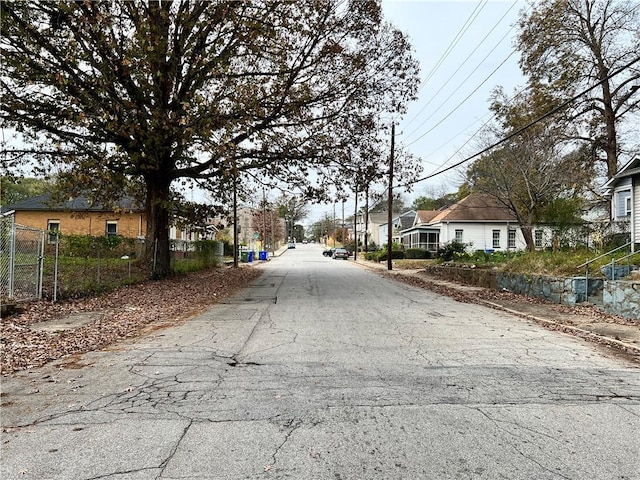 701 Cameron M Alexander Blvd NW, Atlanta, GA 30318 - view of asphalt road with a residential view and sidewalks