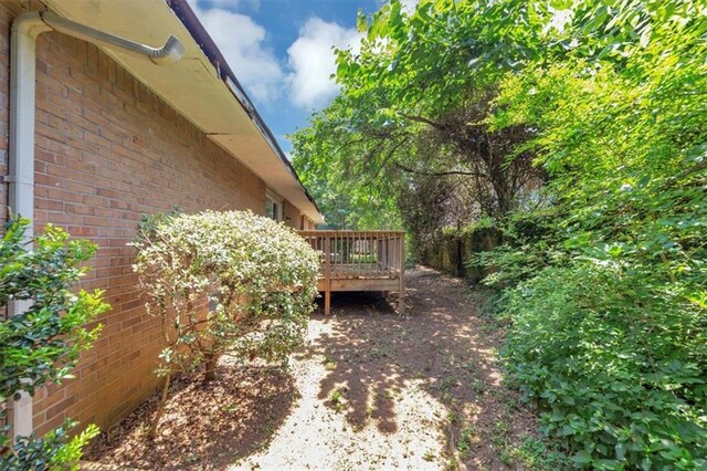 5267 Sheppard Ln, Stone Mountain, GA 30083 - view of yard featuring a wooden deck