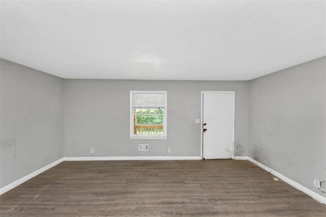 5267 Sheppard Ln, Stone Mountain, GA 30083 - empty room featuring wood finished floors and baseboards