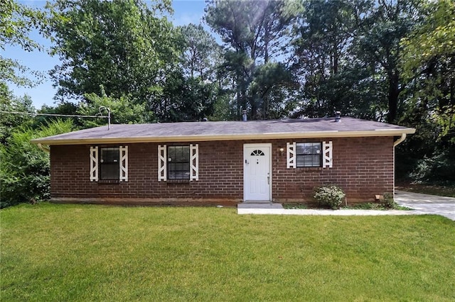 ranch-style house with a front lawn