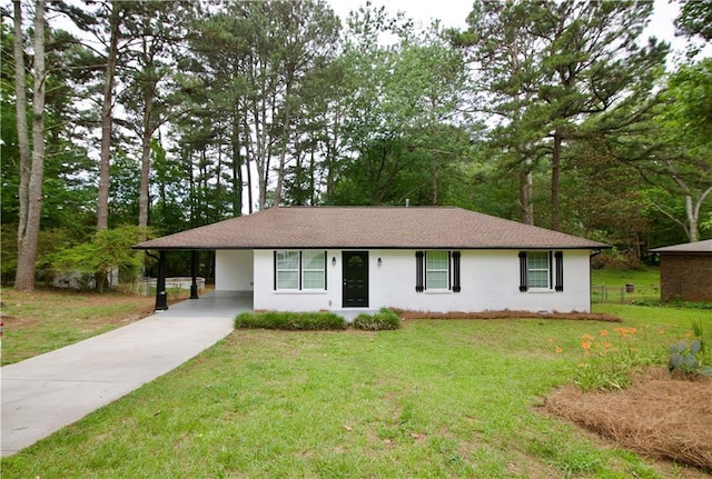 537 Eastside Dr, Dacula, GA 30019 - ranch-style house featuring driveway, a front yard, and a carport