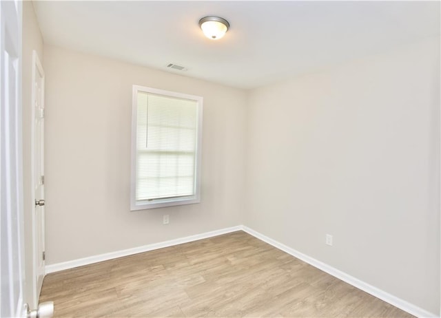 537 Eastside Dr, Dacula, GA 30019 - unfurnished room with light wood finished floors and baseboards