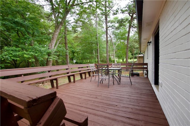 537 Eastside Dr, Dacula, GA 30019 - wooden deck with outdoor dining area