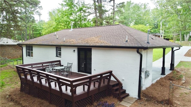 537 Eastside Dr, Dacula, GA 30019 - rear view of house featuring a deck and outdoor dining area