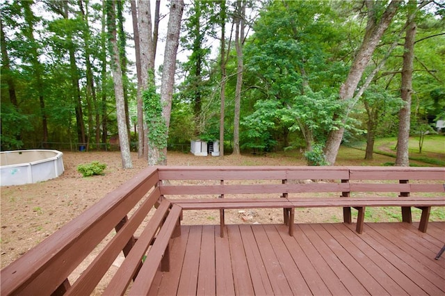 537 Eastside Dr, Dacula, GA 30019 - wooden terrace featuring an outdoor pool