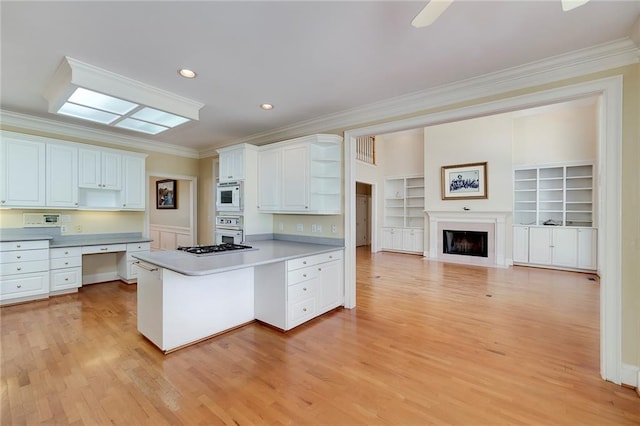 kitchen with open shelves, white appliances, light wood-type flooring, crown molding, and a peninsula