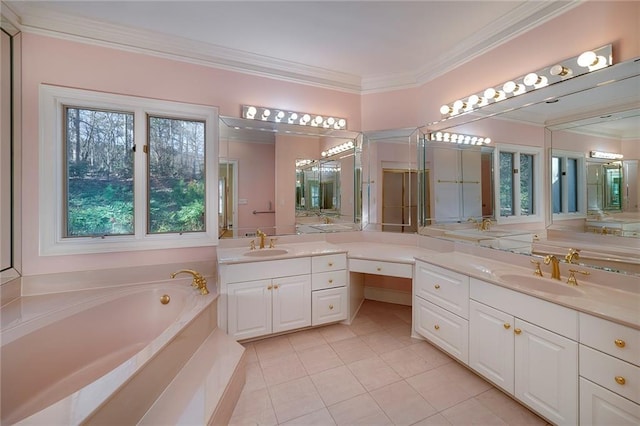 bathroom with crown molding, tile patterned flooring, and a sink