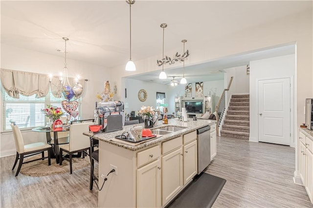446 Vandenburg Dr, Villa Rica, GA 30180 - kitchen with dishwasher, open floor plan, light wood finished floors, and plenty of natural light