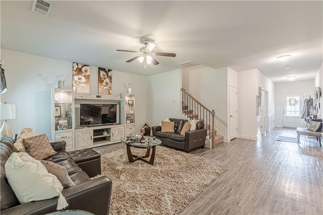 446 Vandenburg Dr, Villa Rica, GA 30180 - living room with wood finished floors, stairs, ceiling fan, and baseboards