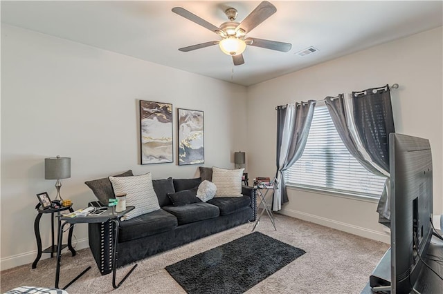 446 Vandenburg Dr, Villa Rica, GA 30180 - carpeted living room with baseboards and ceiling fan