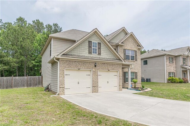 446 Vandenburg Dr, Villa Rica, GA 30180 - craftsman-style home featuring concrete driveway and brick siding