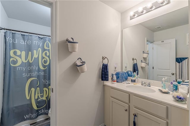446 Vandenburg Dr, Villa Rica, GA 30180 - bathroom featuring vanity and a shower with curtain