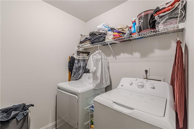 446 Vandenburg Dr, Villa Rica, GA 30180 - laundry room featuring separate washer and dryer and baseboards