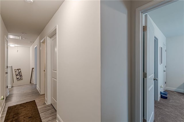 446 Vandenburg Dr, Villa Rica, GA 30180 - hallway with an upstairs landing, attic access, and baseboards
