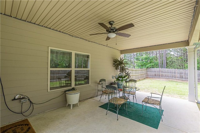 446 Vandenburg Dr, Villa Rica, GA 30180 - fenced backyard with ceiling fan and a patio area