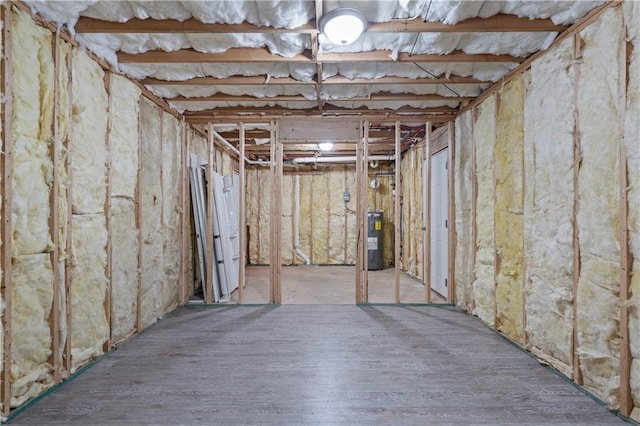 unfinished below grade area with electric water heater