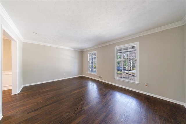 unfurnished room with visible vents, baseboards, ornamental molding, a textured ceiling, and dark wood-style flooring