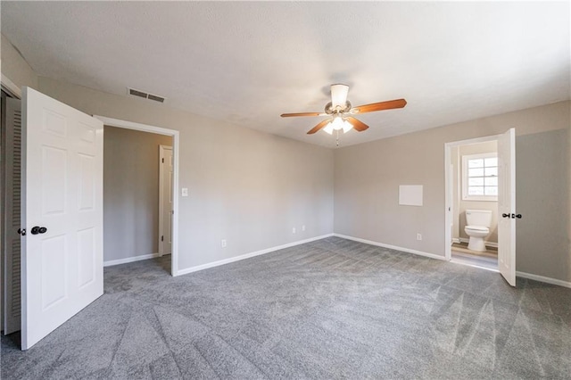 unfurnished bedroom with visible vents, baseboards, and carpet flooring