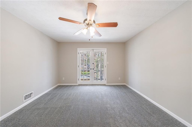 spare room with visible vents, a ceiling fan, french doors, carpet flooring, and baseboards