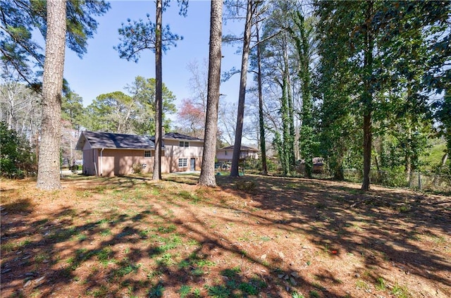 view of yard featuring fence