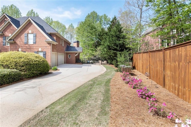 view of yard with a garage