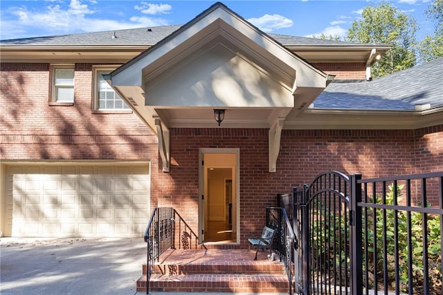 entrance to property featuring a garage