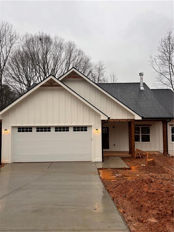 single story home with a garage