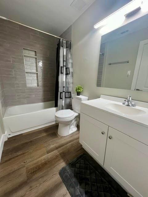 405 Fairburn Rd SW Unit 231, Atlanta, GA 30331 - bathroom featuring vanity, wood finished floors, and shower / bathtub combination with curtain