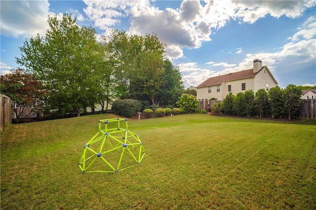 view of yard with fence