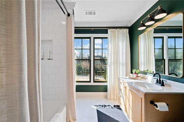 full bathroom with shower / tub combo, visible vents, vanity, ornamental molding, and tile patterned floors