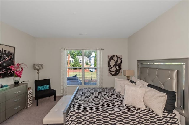 carpeted bedroom with visible vents