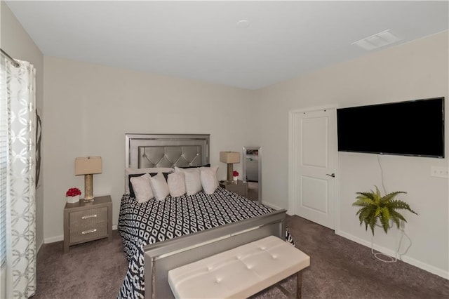 bedroom with carpet, visible vents, and baseboards