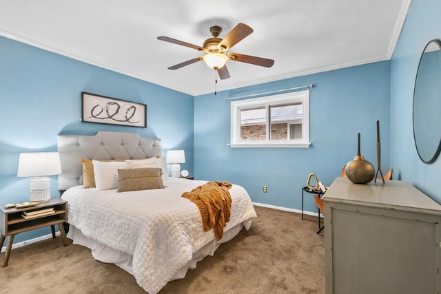 carpeted bedroom featuring ornamental molding and ceiling fan