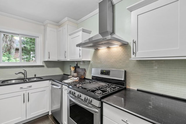 kitchen with tasteful backsplash, sink, white cabinets, stainless steel appliances, and wall chimney exhaust hood