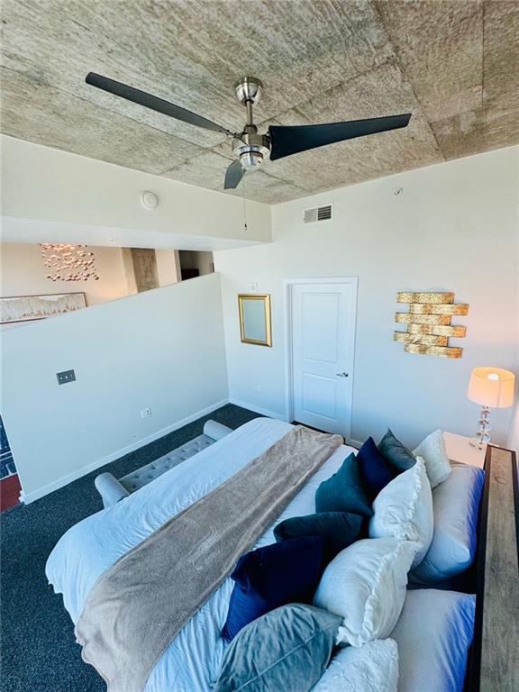 400 W Peachtree St NW Unit 3412, Atlanta, GA 30308 - carpeted bedroom featuring a ceiling fan