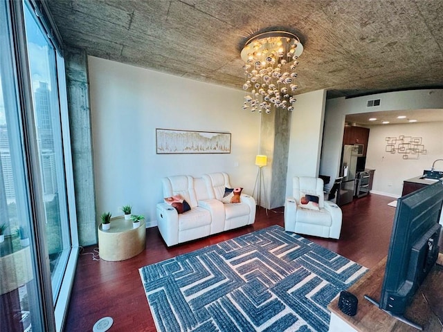 400 W Peachtree St NW Unit 3412, Atlanta, GA 30308 - living room with wood finished floors, a chandelier, and a baseboard radiator