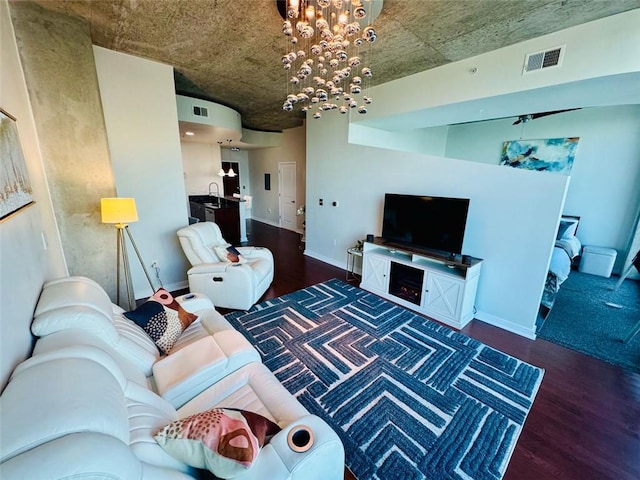 400 W Peachtree St NW Unit 3412, Atlanta, GA 30308 - living area with wood finished floors and a chandelier