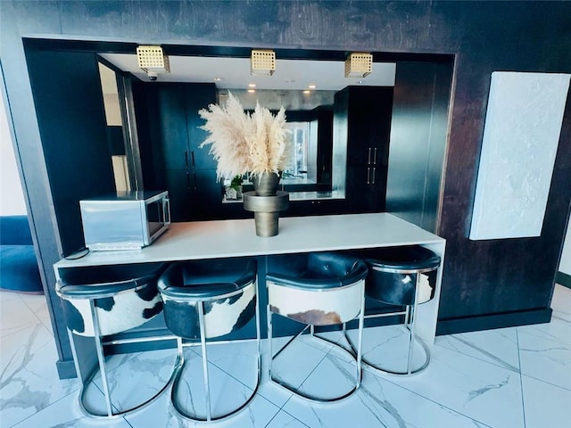 400 W Peachtree St NW Unit 3412, Atlanta, GA 30308 - dining room featuring marble finish flooring