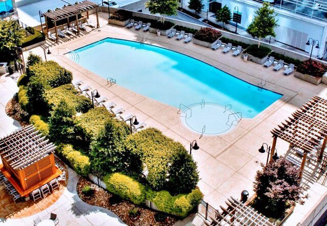 400 W Peachtree St NW Unit 3412, Atlanta, GA 30308 - community pool featuring a pergola and a patio area