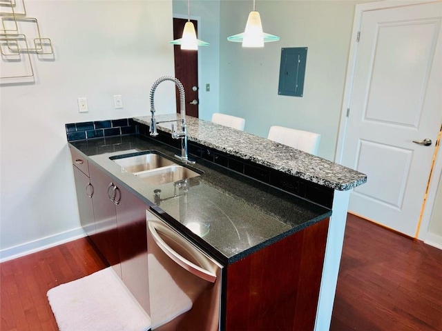 400 W Peachtree St NW Unit 3412, Atlanta, GA 30308 - kitchen with dishwasher, a peninsula, electric panel, dark wood-style flooring, and pendant lighting