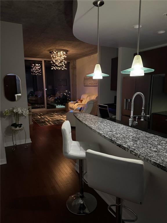 400 W Peachtree St NW Unit 3412, Atlanta, GA 30308 - bar with wood finished floors and pendant lighting