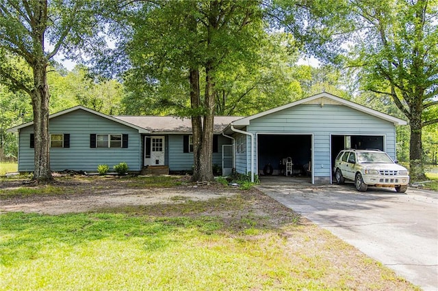 83 Manning Lake Rd, Rome, GA 30165 - single story home with concrete driveway, a front yard, and a garage