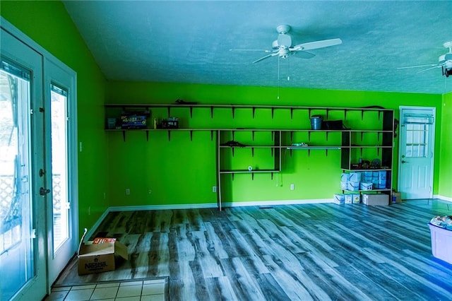 83 Manning Lake Rd, Rome, GA 30165 - unfurnished living room featuring a ceiling fan, a textured ceiling, and wood finished floors