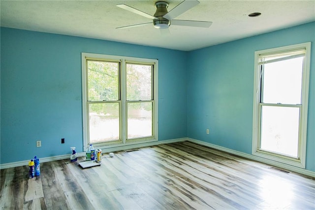 83 Manning Lake Rd, Rome, GA 30165 - empty room featuring a ceiling fan and wood finished floors