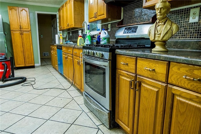 83 Manning Lake Rd, Rome, GA 30165 - kitchen featuring gas stove, backsplash, brown cabinetry, ornamental molding, and light tile patterned floors
