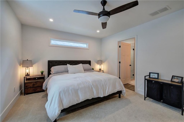 bedroom with light carpet, baseboards, visible vents, and recessed lighting