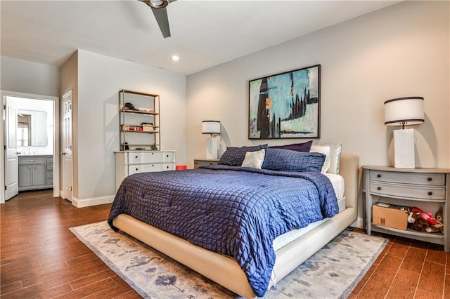 bedroom with wood finished floors, baseboards, ceiling fan, recessed lighting, and ensuite bath