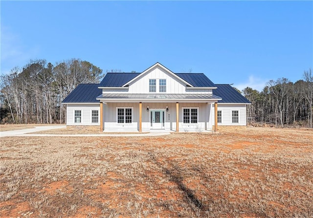 modern farmhouse style home with a porch