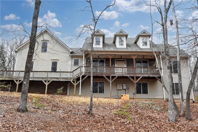 rear view of property with a deck